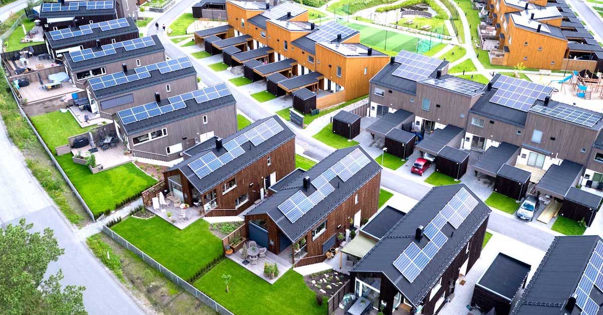house in countryside with solar panels